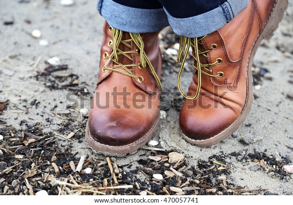 brown boots yellow laces