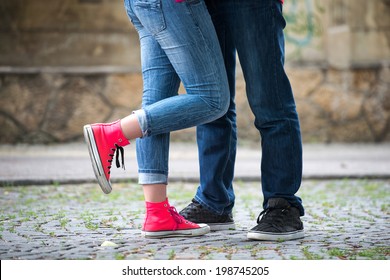 Legs Of A Couple Of Teenagers In Love