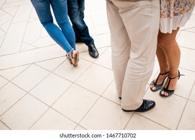 Legs Of Couples Dancing Argentinian Tango Seen From Above Outdoors On Pavement Moving And Elegantly Dressed