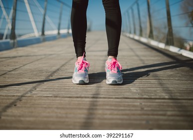Legs detail of a female runner outdoors