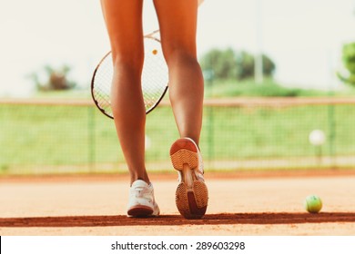 Legs Of Female Tennis Player.Close Up Image.