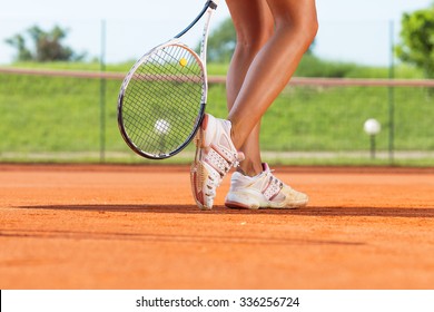 Legs Of Female Tennis Player.Close Up Image.