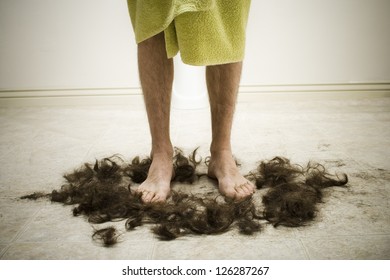 Legs Of Man In Bath Towel Standing In Hair