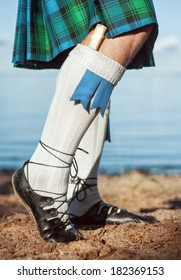 Legs Of Man In Scottish Kilt