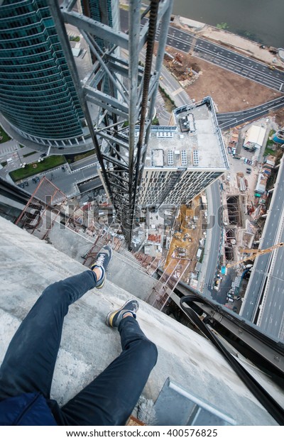 Legs Man Sitting On Roof Tall Stock Photo 400576825 | Shutterstock