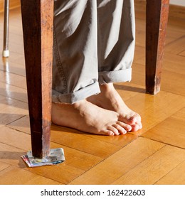 Legs Of A Man Under The Table, Parquet Floor