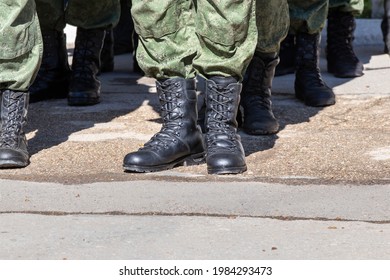  Legs of military personnel in military boots. Topic: army, military uniform - Powered by Shutterstock