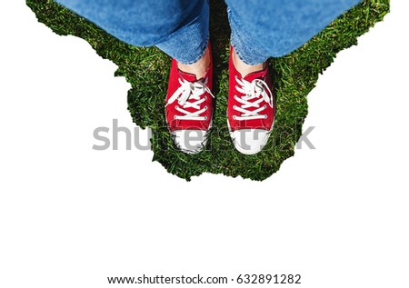 Similar – Person standing on a path with a green leaf nearby