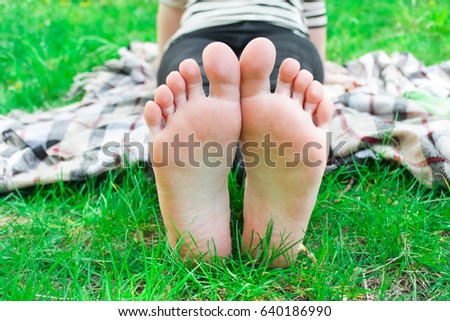  legs on green grass