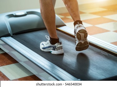 Legs on treadmill.physical therapy - Powered by Shutterstock