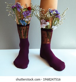 Legs In Polka Dot Socks With Flowers