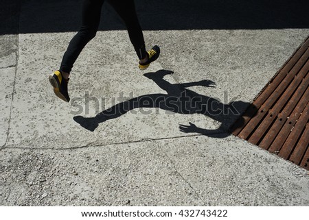 The legs of a runner at the time of running