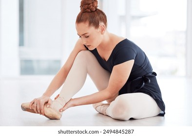 Legs, woman and feet pain for ballet, performance and training in studio with accident, bruise or hurt. Ankle, dancer and foot injury for dance, workout and exercise in hall with muscle inflammation - Powered by Shutterstock