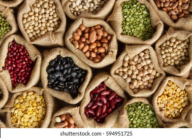 Legumes bean seed in sack, top view - Shutterstock ID 594951725