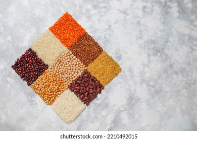 Legumes food background: red bean, red lentlis, corn, mung bean, yellow peas and green peas and rice. Different cereals and legumes, Legumes and beans assortment in different, Mixed dried legumes. - Shutterstock ID 2210492015