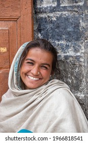 Leh, India - june 24, 2015 : Indian happy girl on the street market in mountain village Leh, Ladakh region, north India, close up