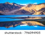 Leh, Ladakh,  India-June 8 2017: Landscape with reflections of the mountains on the  lake named Pagong Tso, situated on the border with India and China.