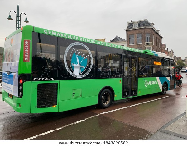 Leiden,\
South Holland / Netherlands - October 3, 2020:  Arriva public\
transport bus at city centre of Leiden. This regional bus operates\
at Gouda, Leiden, Alphen aan den Rijn\
region.