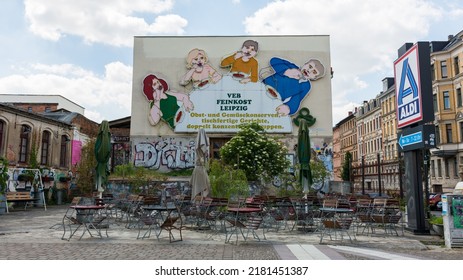 Leipzig, Germany - Jun 2, 2022: View On The So-called Löffelfamilie (spoon Family) At The VEB Feinkost Leipzig. Famous Leuchtreklame (neon Sign) With A Family Eating Soup With Spoons.