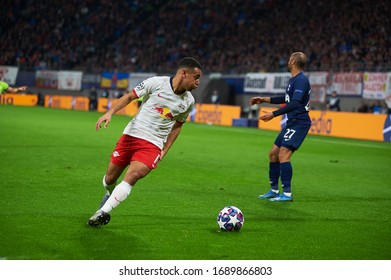 LEIPZIG, GERMANY - MARCH 10, 2020: Tyler Adams Player Of Red Bull Leipzig Vs Lucas Moura Player Of Tottenham 