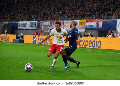 LEIPZIG, GERMANY - MARCH 10, 2020: Tyler Adams Player Of Red Bull Leipzig Vs Lucas Moura Player Of Tottenham 