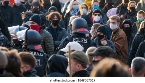 Leipzig, Germany - November 07, 2020: German Police Officers Fight Their Way Through Many People, Demonstrations In Connection With The Coronavirus Measures Of The German Government