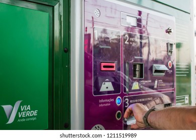 Leiria, Portugal - August 2018: Man Getting Receipt From Unmanned Toll Both In Portuguese Highway.