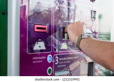 Leiria, Portugal - August 2018: Man Using Credit Card To Pay Unmanned Toll Both In Portuguese Highway.