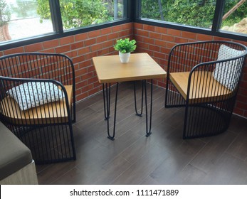 leisure corner with modern chairs and table in coffee shop. - Shutterstock ID 1111471889