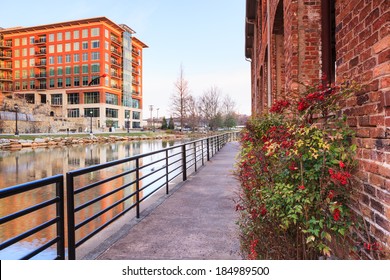 Leisure path along the Reedy River at River Walk Place in downtown Greenville, South Carolina.