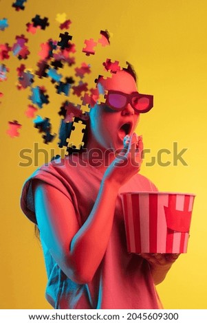 Image, Stock Photo Cheerful young woman watching a movie