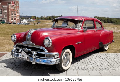 LELYSTAD, THE NETHERLANDS - JUNE 17: 1953 Pontiac Chieftain on display at the annual National Oldtimer day on June 17, 2012 in Lelystad, The Netherlands