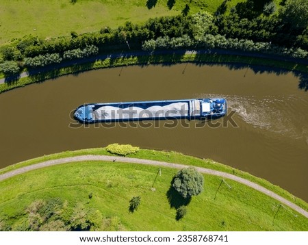 Lembeek, Halle, Vlaams Brabant, Belgium,Sep 5th 2023, cargo ship or barge passing on the Canal Brussels Charleroi, which is a man made waterway in Belgium. It's still in active use in transporting
