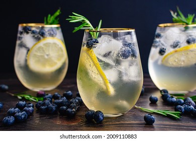 Lemon Blueberry Vodka Spritzer Cocktails: Vodka Cocktails Garnished With Lemon, Blueberries, And Rosemary