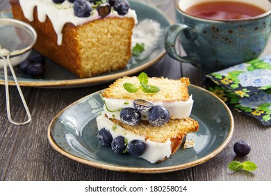 Lemon Cake With Blueberry Glaze.