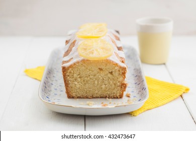 Lemon Cake With Icing Decorated With Lime Slices