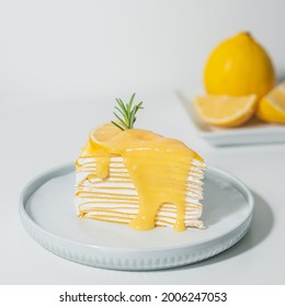 Lemon Cake On White Table Food And Dessert Concept.