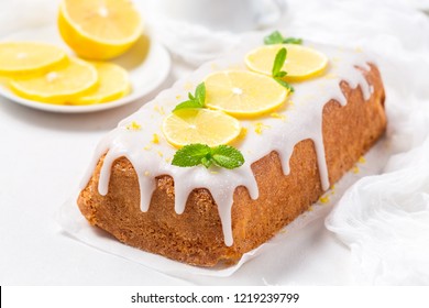 Lemon Cake With Sugar Icing On A White Background