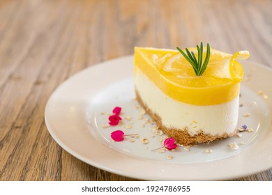 Lemon Cheese Cake On Plate In Cafe And Restaurant