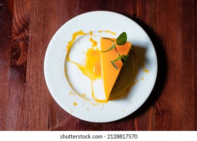 Lemon Cheesecake On A Plate. Light Dessert Top View.