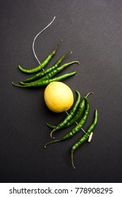 Lemon Chilies Tied With Thread And Tied For Hanging On Doors At Home OR Shop To Avoid Any Bad Fortune Also Known As Totka Or Nazar Battu