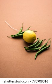 Lemon Chilies Tied With Thread And Tied For Hanging On Doors At Home OR Shop To Avoid Any Bad Fortune Also Known As Totka Or Nazar Battu