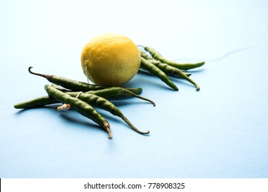 Lemon Chilies Tied With Thread And Tied For Hanging On Doors At Home OR Shop To Avoid Any Bad Fortune Also Known As Totka Or Nazar Battu