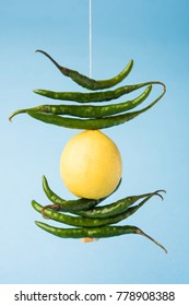 Lemon Chilies Tied With Thread And Tied For Hanging On Doors At Home OR Shop To Avoid Any Bad Fortune Also Known As Totka Or Nazar Battu