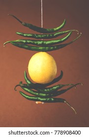 Lemon Chilies Tied With Thread And Tied For Hanging On Doors At Home OR Shop To Avoid Any Bad Fortune Also Known As Totka Or Nazar Battu