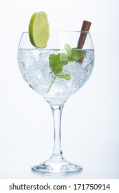 Lemon And Cinnamon Gin Tonic Isolated Over White Background