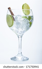 Lemon And Cinnamon Gin Tonic Isolated Over White Background