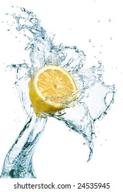 Lemon Is Dropped Into Water Splash