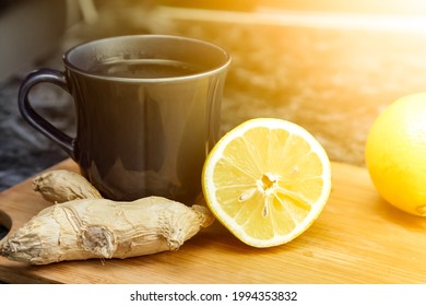 lemon and ginger root on the table, ingredients for the prevention of colds. author's idea of exposure