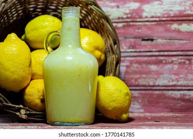 Lemon Juice And Fruits In Wooden Basket. Lemon Juice Is The Best Facilitator To Reduce Weight As The High Content Of Pectin Fiber In This Juice Benefits The Body By Fighting Hunger Cravings.